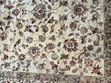 l'image d'un tapis orné d'un motif floral
