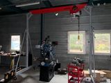 a garage with a lot of tools and equipment in it