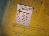 a label on the side of a yellow truck