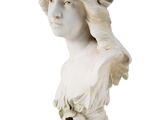 white marble bust of a woman with a flower in her hair