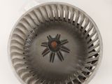 underside view of a metal bowl with a hole in the center