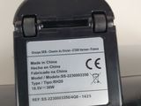 a close up of a cell phone charger on a table