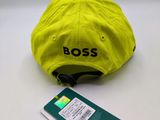 the hat is yellow and has the word boss on it