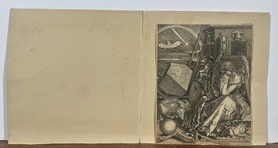 un vieux livre dans lequel figure le dessin d'un homme et d'une femme