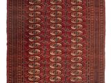 a red and black rug with a pattern on it