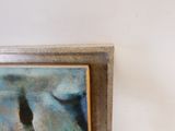 une image d'un tableau accroché au mur