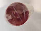 a plastic bag with a red liquid inside of it