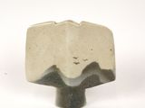 a picture of a ceramic object with a bird flying over it