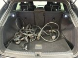 a trunk of a car with a bunch of wires in it