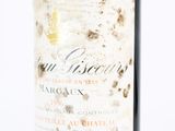 a bottle of wine that is sitting on a table