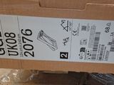 a box with a price tag on it sitting on the floor