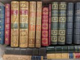 a box full of old books sitting on a table