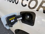 a close up of a gas pump on the side of a truck