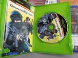the xbox game is in a green case with the disc