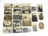 an old photo of a group of men and women posing for a picture