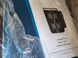 a bag of electronic equipment sitting on a table