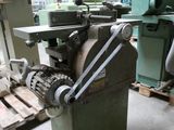 a machine that is sitting in a room with other machines
