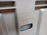 a close up view of a refrigerator door with the door open