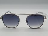 a close up of a pair of sunglasses on a white surface