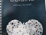 a book about modernist cuisine on a book shelf