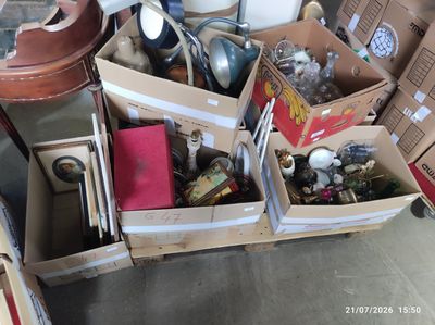 several boxes of assorted items are stacked on top of each other