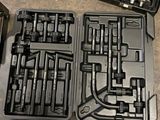 a lot of tools that are laying out on the floor