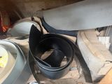 a pile of different types of tools on a table