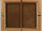 an old picture of a wooden frame with a brown cloth covering