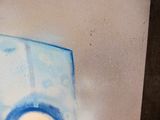 a picture of a painting of a toilet with a blue seat