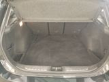 a trunk of a car that is empty with the back seat down