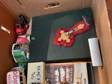 a box full of items that are sitting on the floor