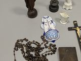 many religious items that are on a table