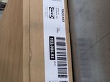 a box with a price label on it sitting on the floor