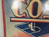 a sign on the wall that says cos fabrication