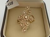 a ring in a box with a price tag on it