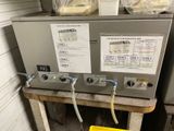a picture of a machine that is sitting on a table