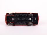 the toy car is red and black with a white background