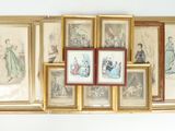 four framed pictures on the wall of a room