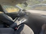 the interior of a car with a dashboard and a steering wheel