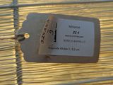 a tag that is attached to a bird cage