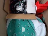 a box with a helmet and other items inside of it