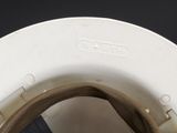 a close up view of a toilet seat with the lid down
