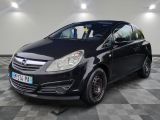a picture of a small black car parked in a garage