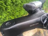 a close up of a bike handle with a blurry background