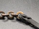 a close up of a metal chain with a clasp on it
