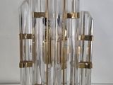 brass and clear glass chandelier with gold accents