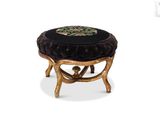 an image of a stool with a black cushion on it