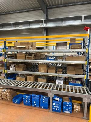 many boxes and boxes on the shelves in the warehouse