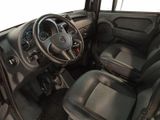 a view of the inside of a vehicle from the driver ' s seat