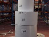 several stacks of boxes stacked on top of each other in a warehouse